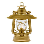 Reflektorschirm für Baby Special 276 auf einer goldenen Sturmlaterne mit warmweißem Licht.