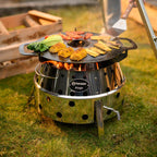 Atago Grillplatte cooking vegetables and meat on grill, showcasing versatile grilling capabilities.
