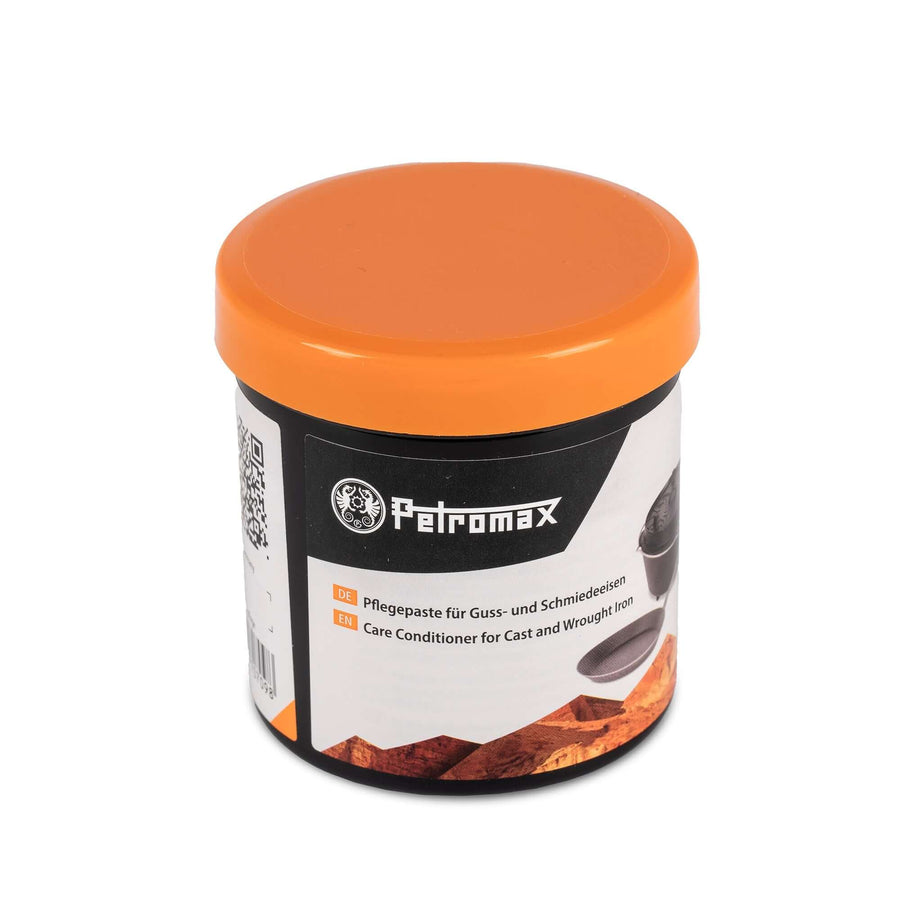 Pflegepaste Gusseisen und Schmiedeeisen in einem Tiegel mit orangefarbenem Deckel von Petromax