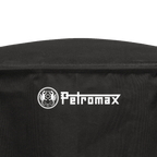 Abdeckhaube für Tyropit auf einem schwarzen Hintergrund mit Petromax-Logo.